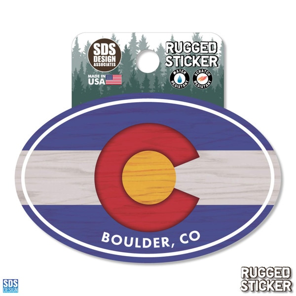 Oval rugged sticker with the Colorado state flag design, featuring a wood texture background and “Boulder, CO” text at the bottom.